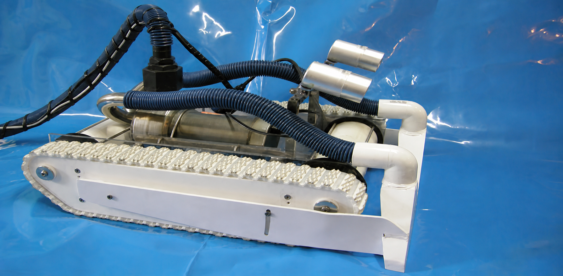 Remotely operated underwater vacuum used for tank inspection and cleaning